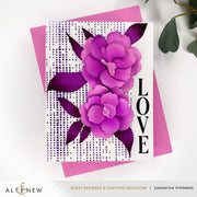 A handmade greeting card featuring two layered purple peony flowers on a white background with a dotted purple pattern, next to the word 'LOVE' in black. The card is layered over a pink envelope, with a white background and decorative green leaves in the corner. Altenew Essential Textures: Canvas Impressions Press Plate card ideas
