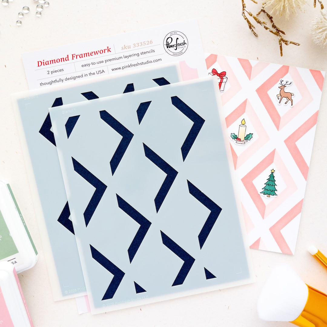 Set of layering stencils called Diamond Framework from Pinkfresh Studio, displayed on a light gray background with a printed instruction sheet and example patterned card designs.