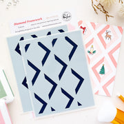 Set of layering stencils called Diamond Framework from Pinkfresh Studio, displayed on a light gray background with a printed instruction sheet and example patterned card designs.