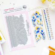 A flat-lay product photo of a stamping plate set by Pinkfresh Studio, featuring the 'Cottage Flourish' design. The left side shows the packaged steel stamp plate in its pink and white cardboard sleeve, while the right side displays the stamped floral and scroll designs in blue, gold, and white ink.