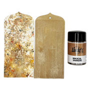 Two gold-colored tags with a hole at the top, shown next to a small jar of Lindy's 'Magical Shakers Cedar & Sass' powder on a plain white background.