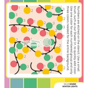 A craft stencil pattern sheet for 'Winter Lights' by Waffle Flower, featuring numbered circular light bulbs in pink, yellow, and green on black branches over a pale peach background, with instructions on the right.