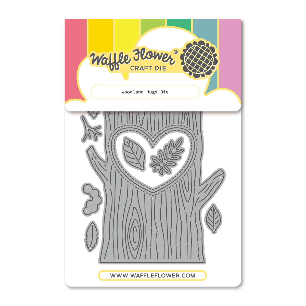 Waffle Flower Craft Die 'Woodland Hugs Die' featuring a gray metal tree trunk and leaf-shaped cutters on a white backing card with a colorful header.