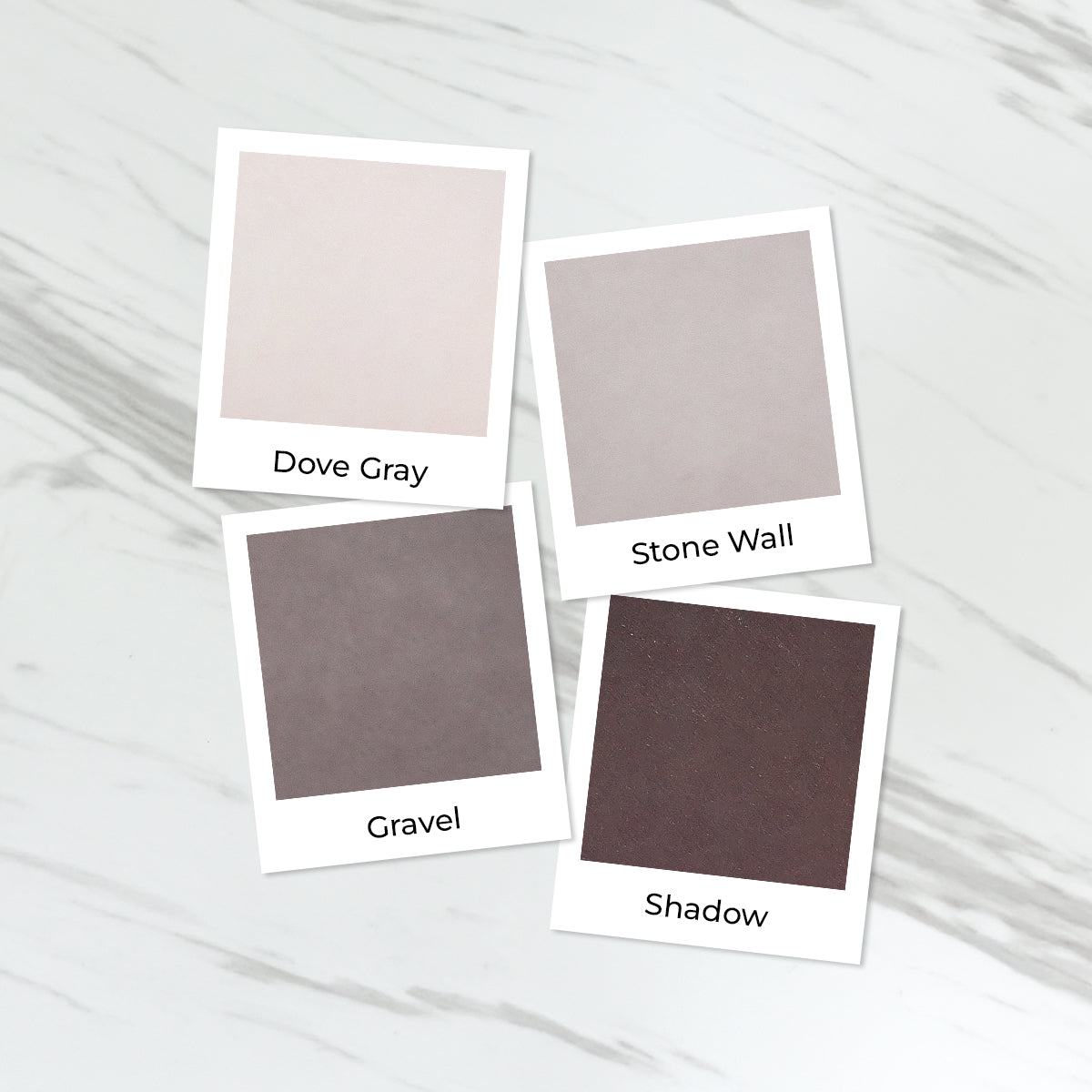Four square color swatches labeled Dove Gray, Stone Wall, Gravel, and Shadow arranged on a light marble surface. Altenew Tranquil Reflections Fresh Dye Ink Mini Pods