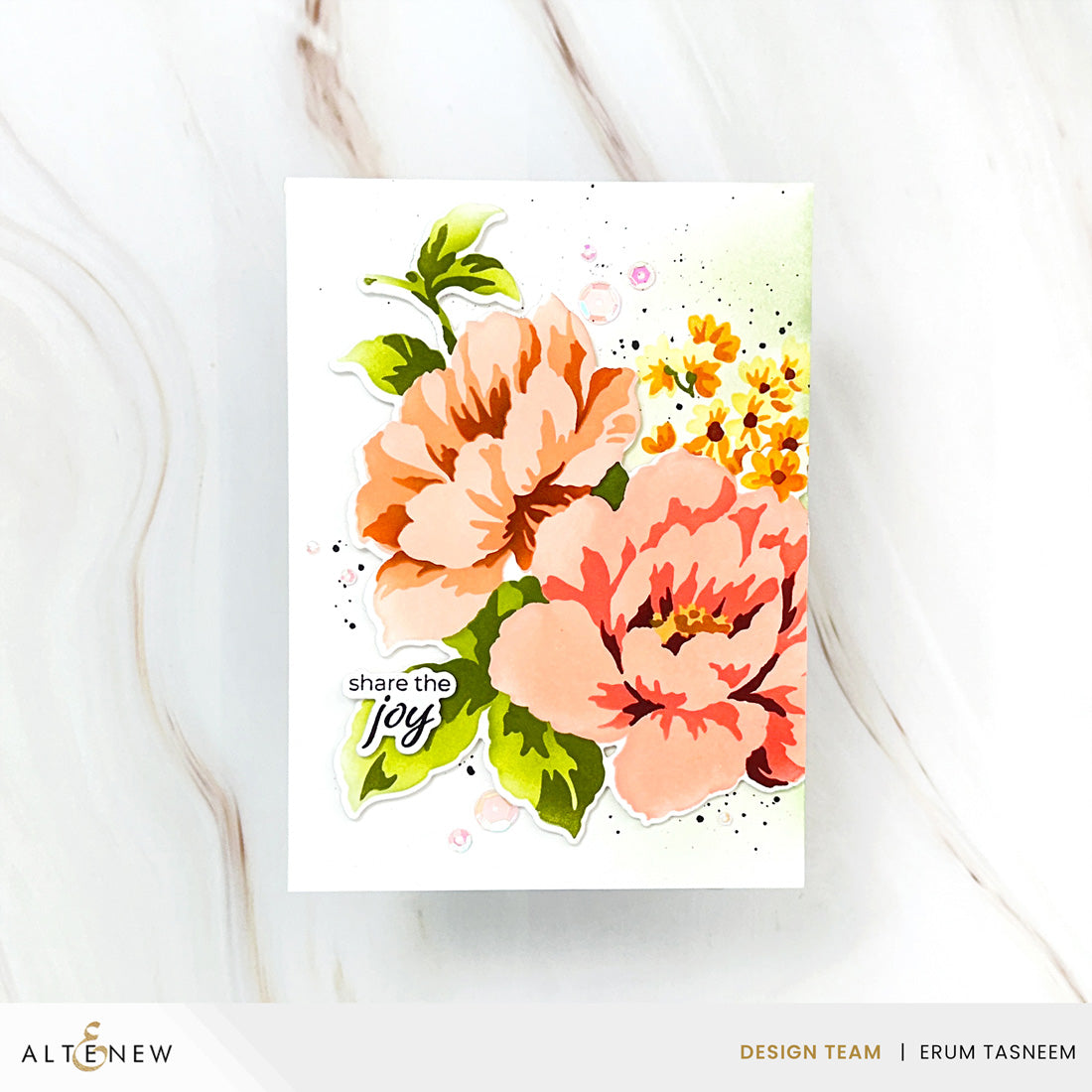 A handmade greeting card featuring watercolor-style flowers in peach, pink, and orange with green leaves, plus the phrase 'share the joy' in black script. The card is photographed on a light marble surface, with ALTENEW branding and designer credit at the bottom.