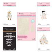Spellbinders crafting dies and embossing folder set displayed on a white background, including a teddy bear, snowman, snow boots, and lettering dies with pink and teal packaging. Spellbinders Christmas Blush I Want It All! Bundle by Frank Garcia