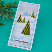 Christmas card with snowy trees and 'Merry Christmas' text on a teal background