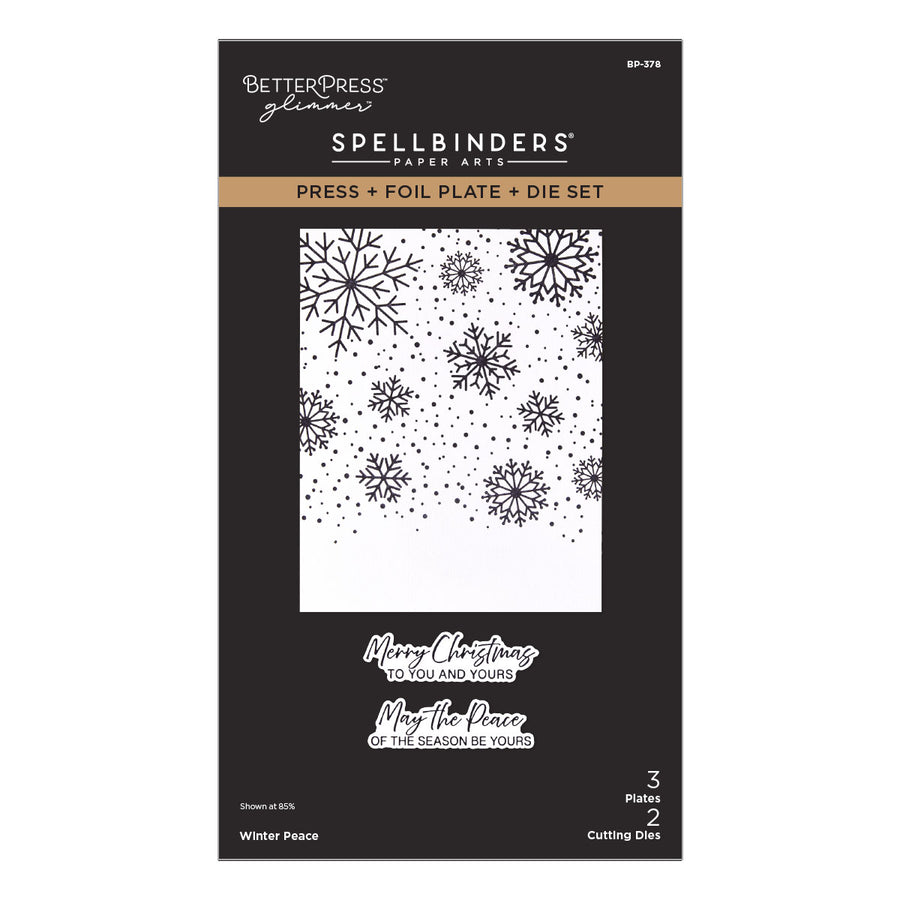 Spellbinders Press + Foil Plate + Die Set by Better Press Glitter, featuring a black package with a white window showing black snowflake and dot foil designs, plus sample holiday phrases. Spellbinders Winter Peace Press + Foil Plate & Die Set
