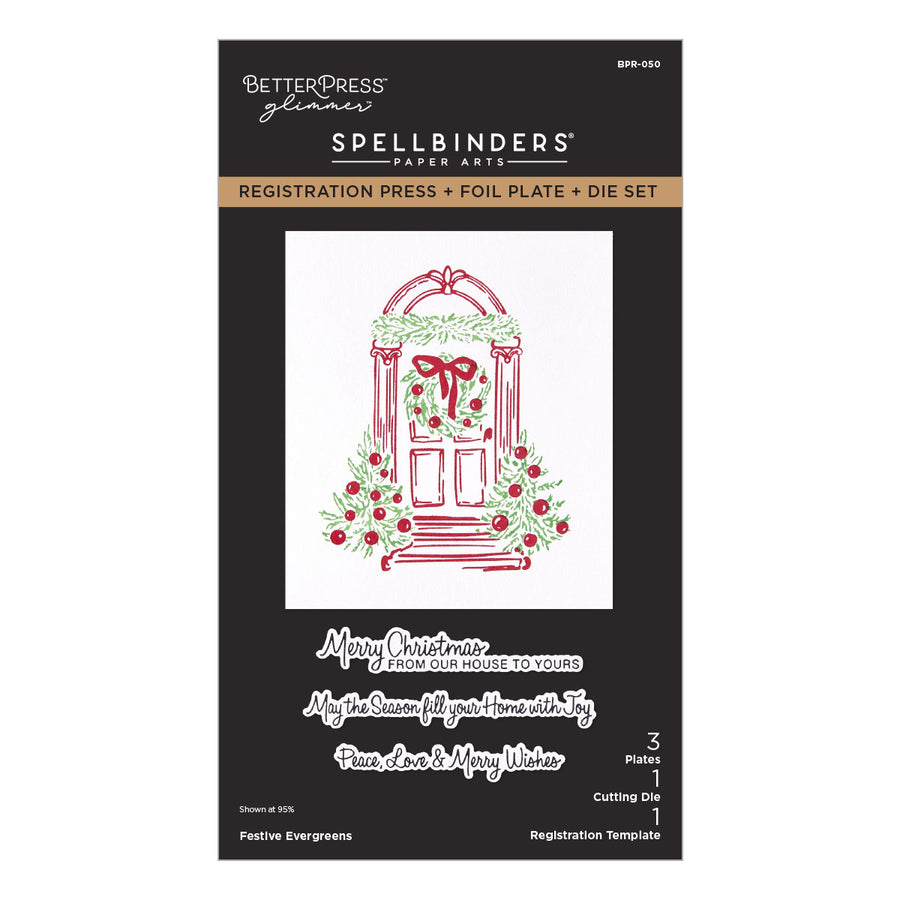 BetterPress Glimmer Spellbinders 'Festive Evergreens' registration press, foil plate, and die set packaging, featuring a red and green wreath design on a white background.