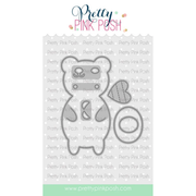 A metal die-cut featuring a bear outline with a stitched heart patch, shown on a white background with repeated Pretty Pink Posh branding and a mint footer. Die is called Bear Holder.