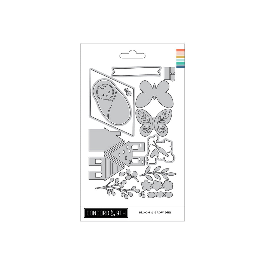 Concord & 9th Bloom & Grow Dies featuring a baby cradle, butterfly, house, flowers, and foliage designs on a white card with a colorful brand stripe.