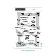 Concord & 9th 'Bloom & Grow' stamp set packaging showing a gray rectangular stamp block with black text and floral motifs, plus a small color strip indicating included stamp colors.