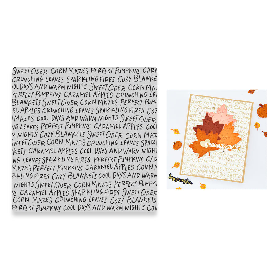 A handmade greeting card with layered autumn leaves in orange, brown, and red, layered over a beige background printed with the phrase 'SWEETCIDER CORN MAZES PERFECT PUMPKIN CARAMEL APPLES CRUNCHING LEAVES SPARKLING FIRE COZY BLANKETS O LAYS AND WARM NIGHTS'. A handwritten list of similar phrases appears to the left of the card on a white background.