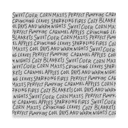 A cling stamp featuring a hand-written style gray text pattern on a white background, with the text reading 'SWEET CIDER CORN MAZES PERFECT PUMPKINS CARAMEL APPLES CRUNCHING LEAVES SPARKLING FIRES COZY BLANKETS' and repeating around the border.