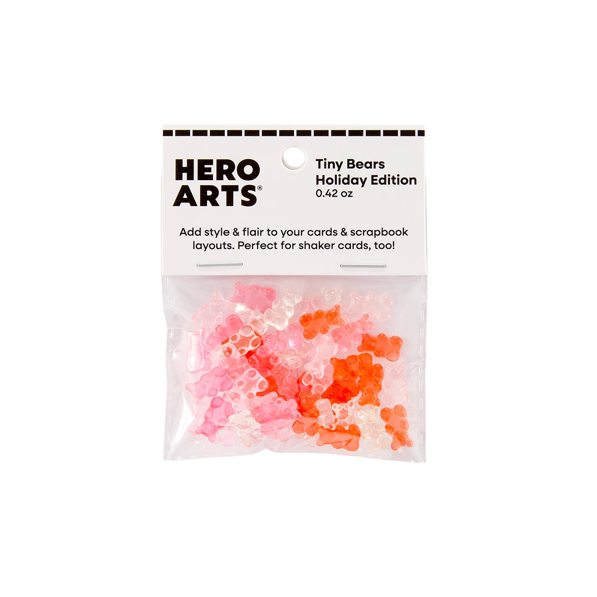 A clear plastic bag containing small translucent teddy bear-shaped embellishments in pink, coral, and orange, attached to a white Hero Arts Holiday Edition header card on a plain white background.