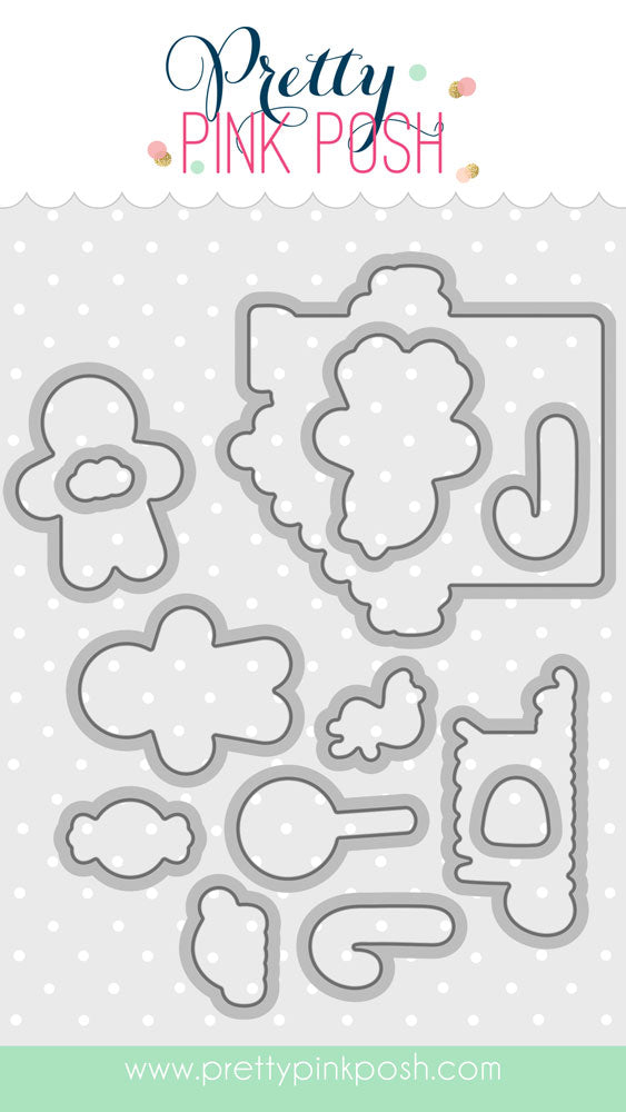 A sheet of craft dies from Pretty Pink Posh, featuring various cloud, leaf, and abstract shapes in silver metal over a white polka dot background, with the brand name at the top and a website URL at the bottom. Pretty Pink Posh Christmas Gingerbread Coordinating Dies