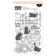Hero Arts DC377 clear stamp and die set titled ' Hide and Peek' featuring autumn-themed designs including pumpkins, leaves, cats, and fall phrases on a white background.