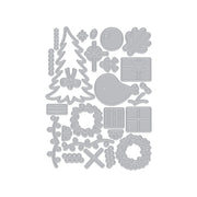 A set of gray metal cutting dies arranged on a plain white background, featuring holiday and Christmas-themed shapes including a Christmas tree, wreath, gift boxes, ornaments, and floral motifs. Hero Arts Beep Beep Holiday Extras Die Set