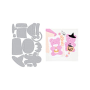 A craft die-cut kit showing the gray metal cutting templates on the left and the finished pink Halloween-themed bear stickers on the right, set against a plain white background.