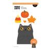 A product card for Hero Arts 'Kitty Squeezer' 15 cutting dies, featuring a cute cartoon gray cat with orange eyes and a pumpkin, candy corn, and maple leaf above it. The card includes product details, a die set label, and a small preview of the interactive cat holding a gingerbread man.