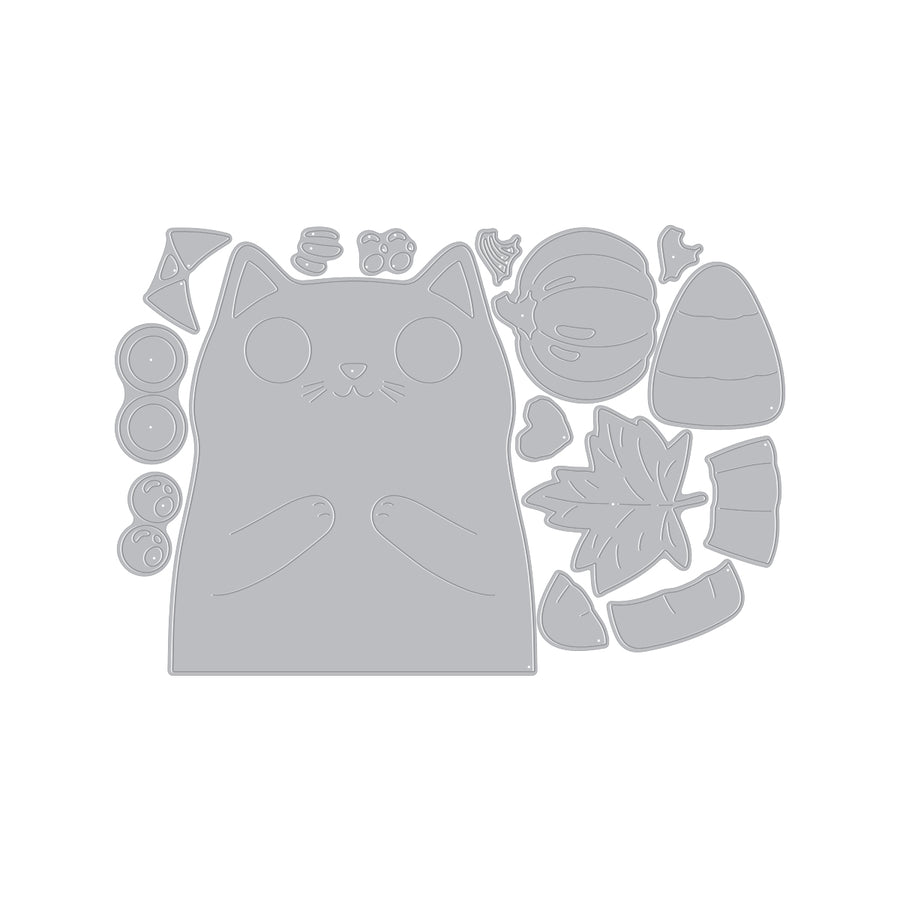 A gray die-cut craft template featuring a cute cartoon cat face surrounded by autumn-themed shapes including a pumpkin, acorn, leaf, and candy corn, shown on a plain white background.