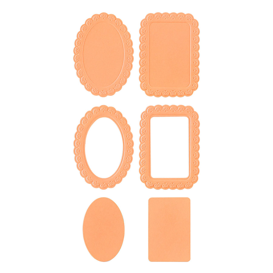 Six peach-colored paper cutters or dies in various shapes including two oval frames, two rectangular scalloped frames, and two solid shapes, arranged on a plain white background. Spellbinders Scalloped Frames 3D Emboss & Cut Folder