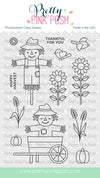 A sheet of Pretty Pink Posh photopolymer clear stamps featuring autumn harvest designs, including two scarecrows, sunflowers, wheat, pumpkins, a bird, and the phrases 'HAPPY HARVEST', 'THANKFUL FOR YOU', and 'Thanksgiving'. Pretty Pink Posh Fall Scarecrows Stamp Set