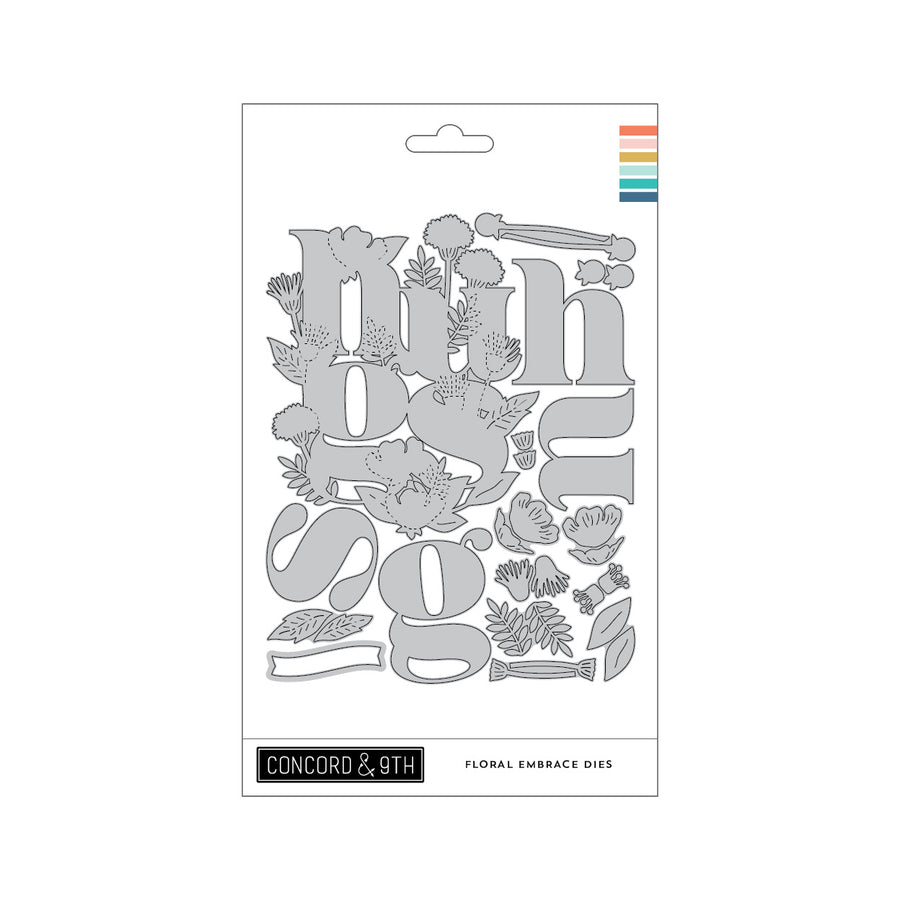 Concord & 9th Floral Embrace Dies set in a white hanging card package, featuring gray metal letter and flower cutout designs on a white background.