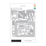 Concord & 9th 'Holiday Home Dies' paper crafting die set in its retail packaging, featuring multiple gray metal dies for creating Christmas-themed shapes and patterns.