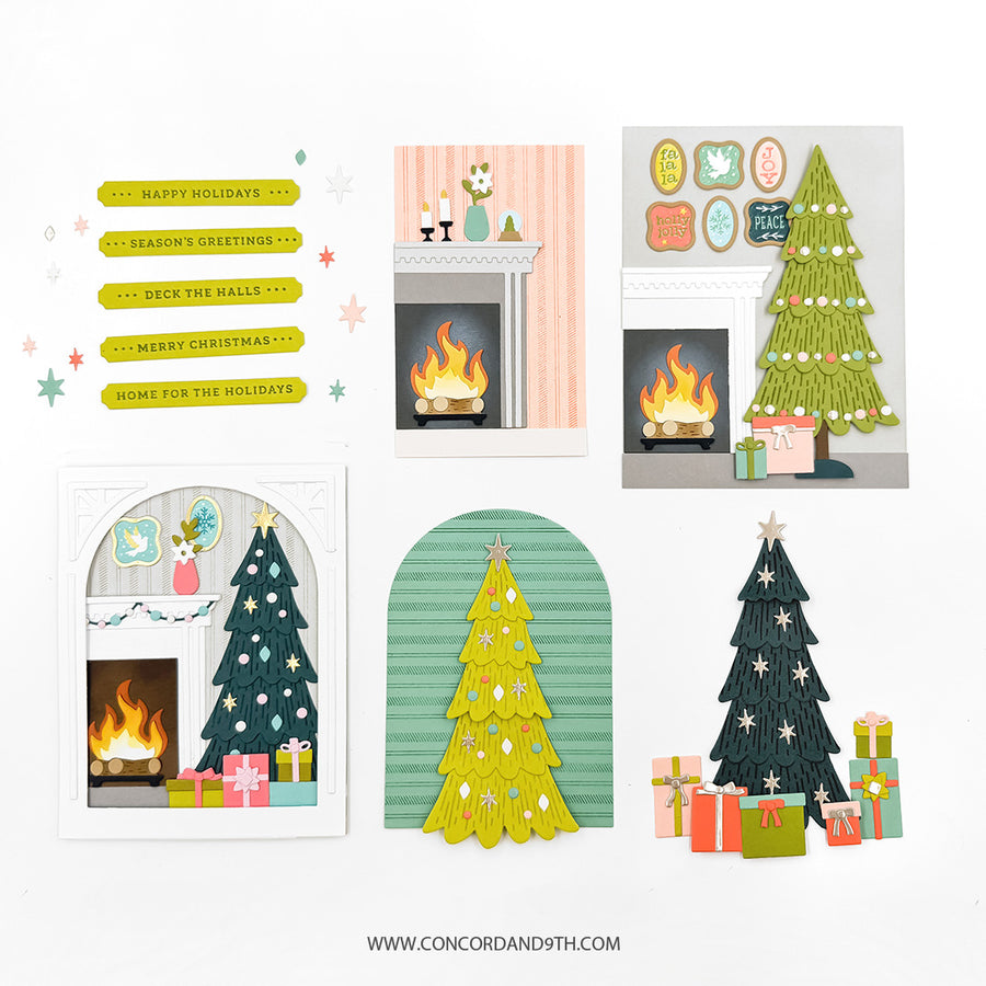 A set of Christmas-themed greeting cards and decorative paper cutouts arranged on a white background. The designs include fireplace scenes with flames, decorated Christmas trees, gift boxes, holiday signs, and festive text banners.