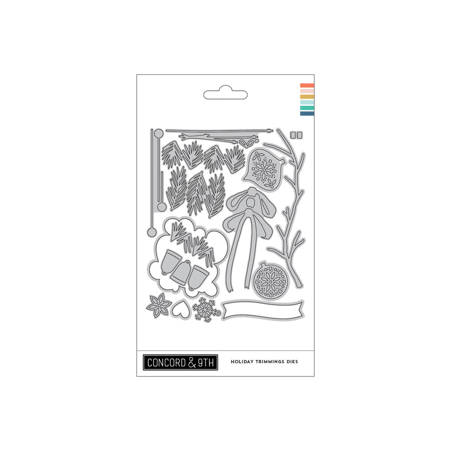 A packaged set of holiday tree twigs die-cut stickers or decals on a white backing card. The card shows multiple outlined twig motifs including pine branches, acorns, a bird, a hanging ornament, and a blank banner.