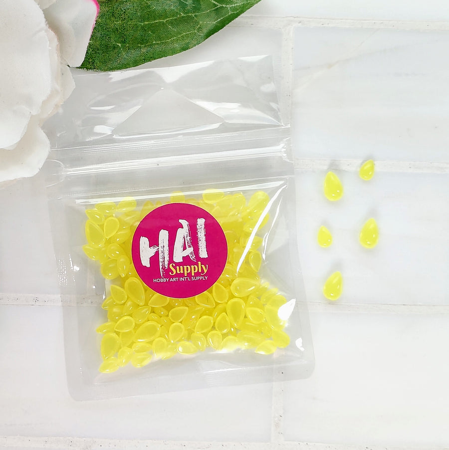 Pear Blossom Press - HAI Candle Flame Gems (0.8 oz pack) yellow plastic flame shaped gems, assorted sizes