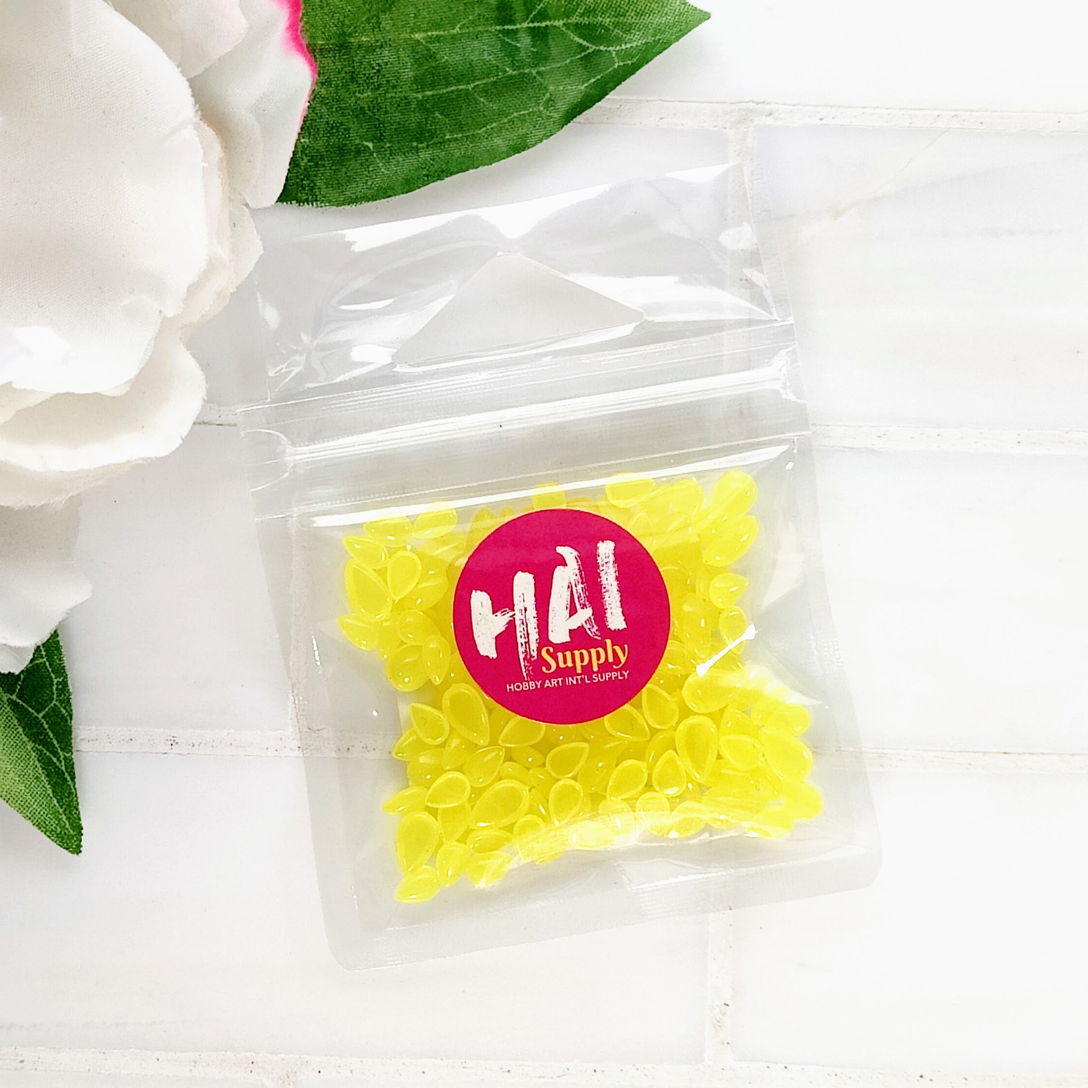 Pear Blossom Press - HAI Candle Flame Gems (0.8 oz pack) yellow plastic flame shaped gems, assorted sizes