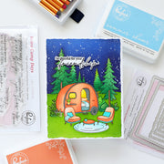 Card with a camping scene and 'So grateful for your friendship' text, surrounded by craft supplies.