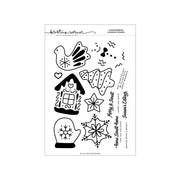 A clear stamp sheet featuring black holiday-themed cookie and winter illustrations, including a bird, gingerbread house, cookie, snowflake, mitten, star, and decorative text. The sheet is branded with 'Kristina Werner' and 'Christmas Cookies Stamps' at the top.