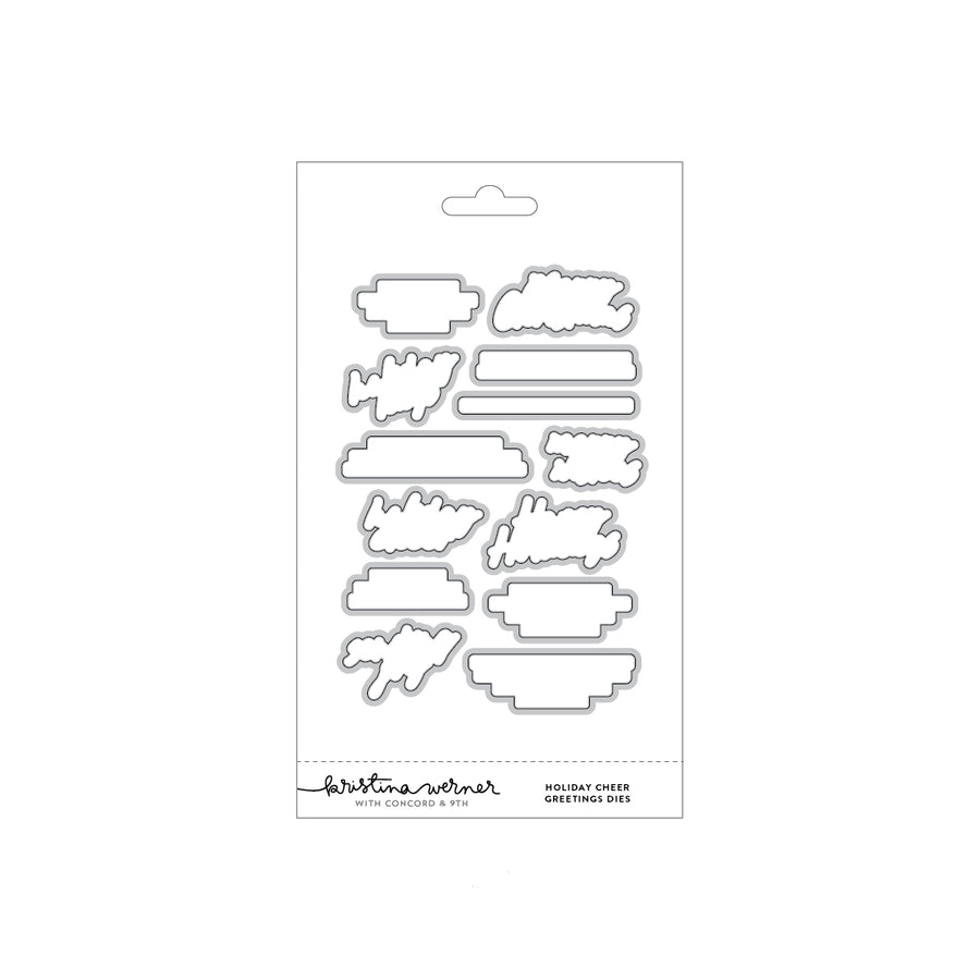 A package of holiday cheer greeting card dies by Kristina Werner, featuring multiple silver metal die-cut shapes on a white backing card.