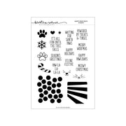 A sheet of clear stamp blanks with black printed holiday and paw-themed designs, including paw prints, snowflakes, candy canes, and festive phrases. The sheet is branded 'Concord & 9th (Kristina Werner) Happy Pawlidays Stamp Set'.