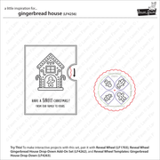 Instructional graphic for a gingerbread house craft set, showing a black-and-white gingerbread house printable/card design on the left and a circular reveal wheel with four house illustrations on the right. Text explains how to pair the set and includes the brand name Lawn Fawn.
