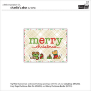 A holiday greeting card design preview on a white page. The central card reads 'merry christmas' in green and red lettering, with small cartoon animals and gifts below. Lawn Fawn Charlie's ABC's Dies