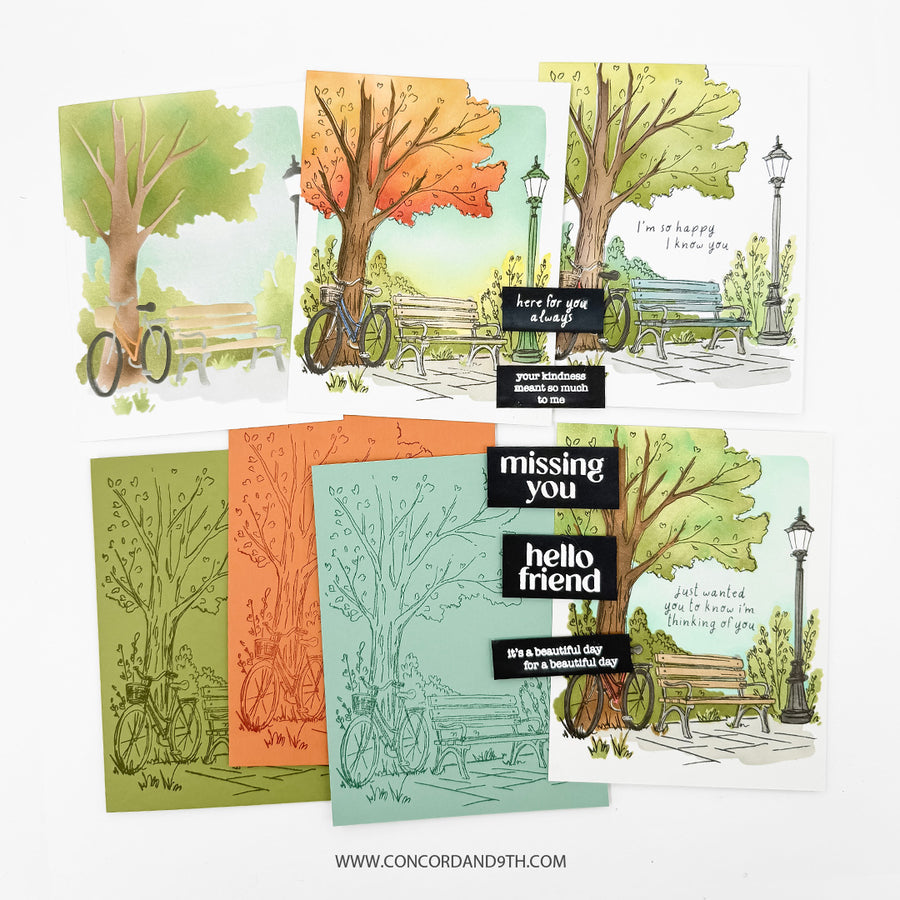 Six illustrated handmade greeting cards arranged on a white background, featuring trees, benches, bicycles, and black text boxes with phrases such as 'here's to you sleep,' 'your wonderful smile is so much fun,' 'missing you hello friend,' and 'it's a beautiful day for a beautiful day.'.