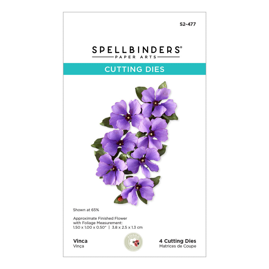 Spellbinders Paper Arts Cutting Dies package featuring a purple vinca flower illustration on a white background with a teal banner.