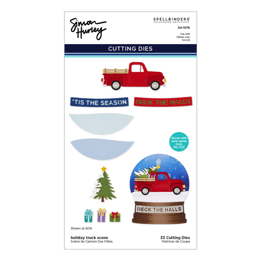 Spellbinders by Simon Hurley holiday truck scene cutting dies sheet, featuring a red pickup truck with a Christmas load, snow globe scene, tree, gifts, and holiday text decals on a white card. Spellbinders Holiday Truck Scene Etched Dies by Simon Hurley