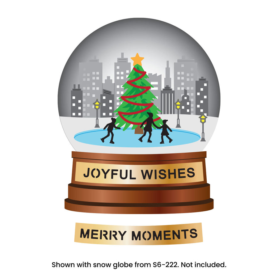 A festive snow globe illustration with a decorated Christmas tree, city skyline, and three silhouetted figures on a blue rink, set on a brown pedestal that reads 'JOYFUL WISHES.' Below the globe is a separate banner reading 'MERRY MOMENTS. Spellbinders City Skating Scene Etched Dies by Simon Hurley