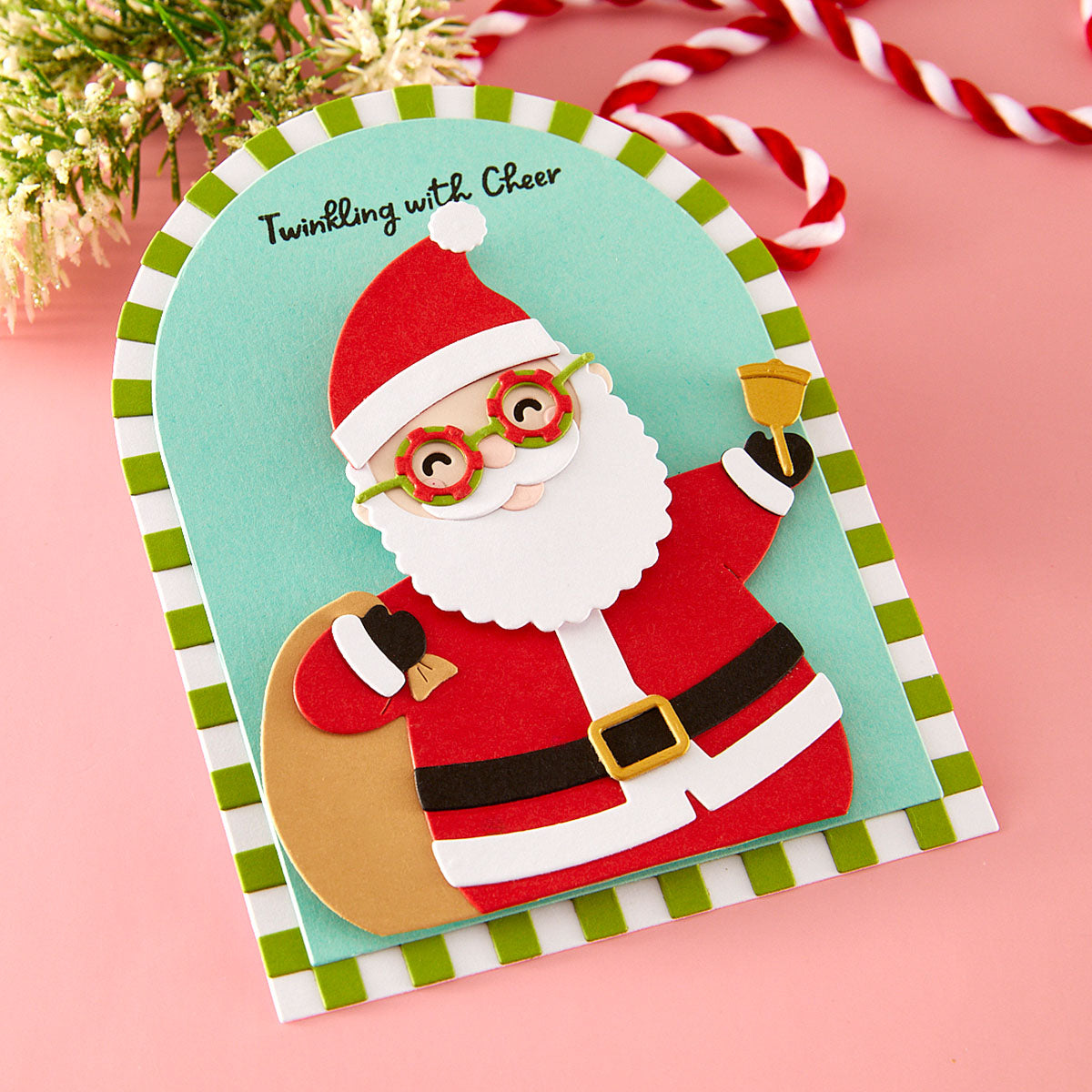Christmas card with a cartoon Santa Claus on a pink background Spellbinders Spectacular Christmas collection