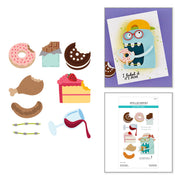 A sheet of cute food-themed sticker designs shown alongside a printed example card and packaging insert on a white background. The designs include donuts, chocolate pieces, a chicken leg, a slice of cake, sausage, straws, and a wine glass, with one example card featuring a blue monster holding a donut and the text 'I licked it - it's mine'. Spellbinders One More Bite Etched Dies