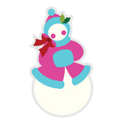 A stylized cartoon snowman with a pink and light blue body, red bow, green holly leaves, and a white base on a plain white background. Spellbinders Festive Snowlady Etched Dies by Lolli & Grace
