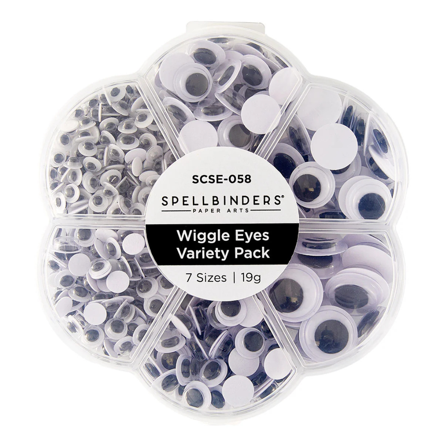 Spellbinders Paper Arts Wiggle Eyes Variety Pack in a clear plastic clamshell container with seven compartments, showing a mix of white, black, and gray googly eyes in different sizes.