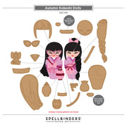 Spellbinders Paper Arts Autumn Kokeshi Dolls craft kit pattern sheet, featuring two assembled doll figures in pink and beige robes with various matching paper cutout parts such as hair, face, glasses, and accessories arranged around them on a white background.