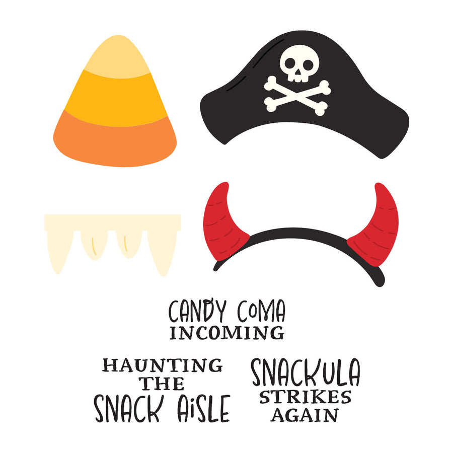 A set of cartoon-style Halloween costume accessory graphics on a white background: a candy corn, a black pirate hat with a white skull and crossbones, red devil horns, and a cream fang grin. Text below reads 'CANDBY COMA INCOMING', 'HAUNTING THE SNACK AISLE', and 'SNACKULA STRIKES AGAIN'. Spellbinders Snackula Stamp & Die Set