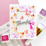Floral card with 'Thanks' text on a pink background